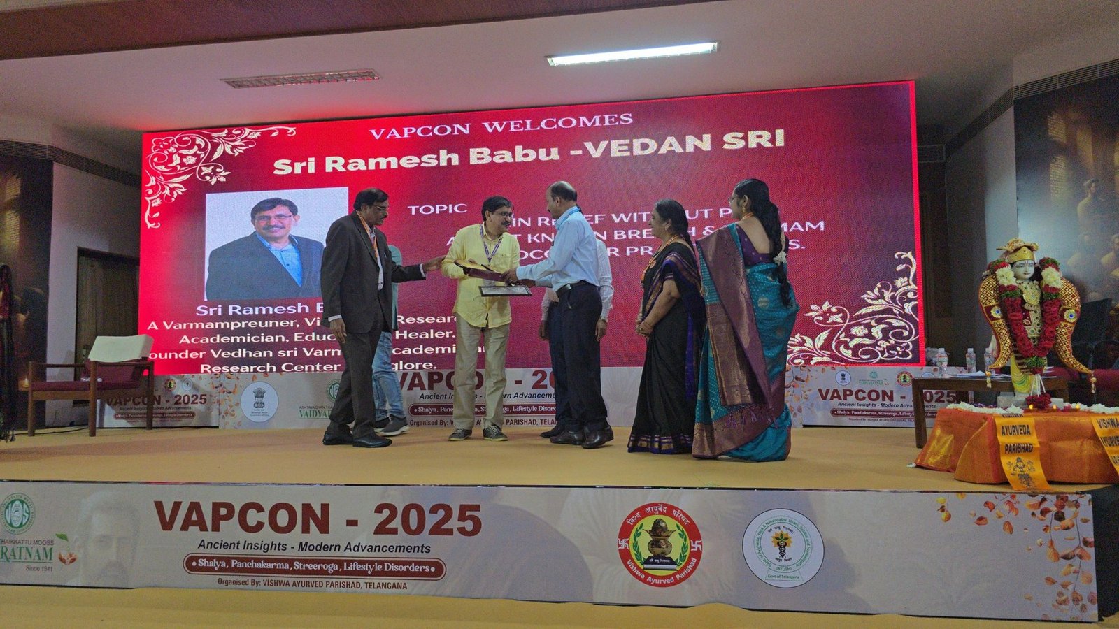Vedhan Sri being honoured on stage